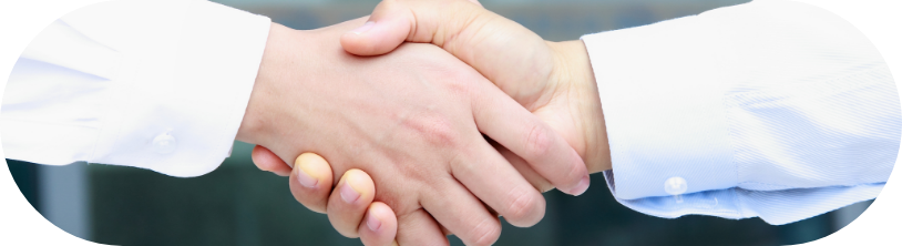 IT consultants shaking hands with a client